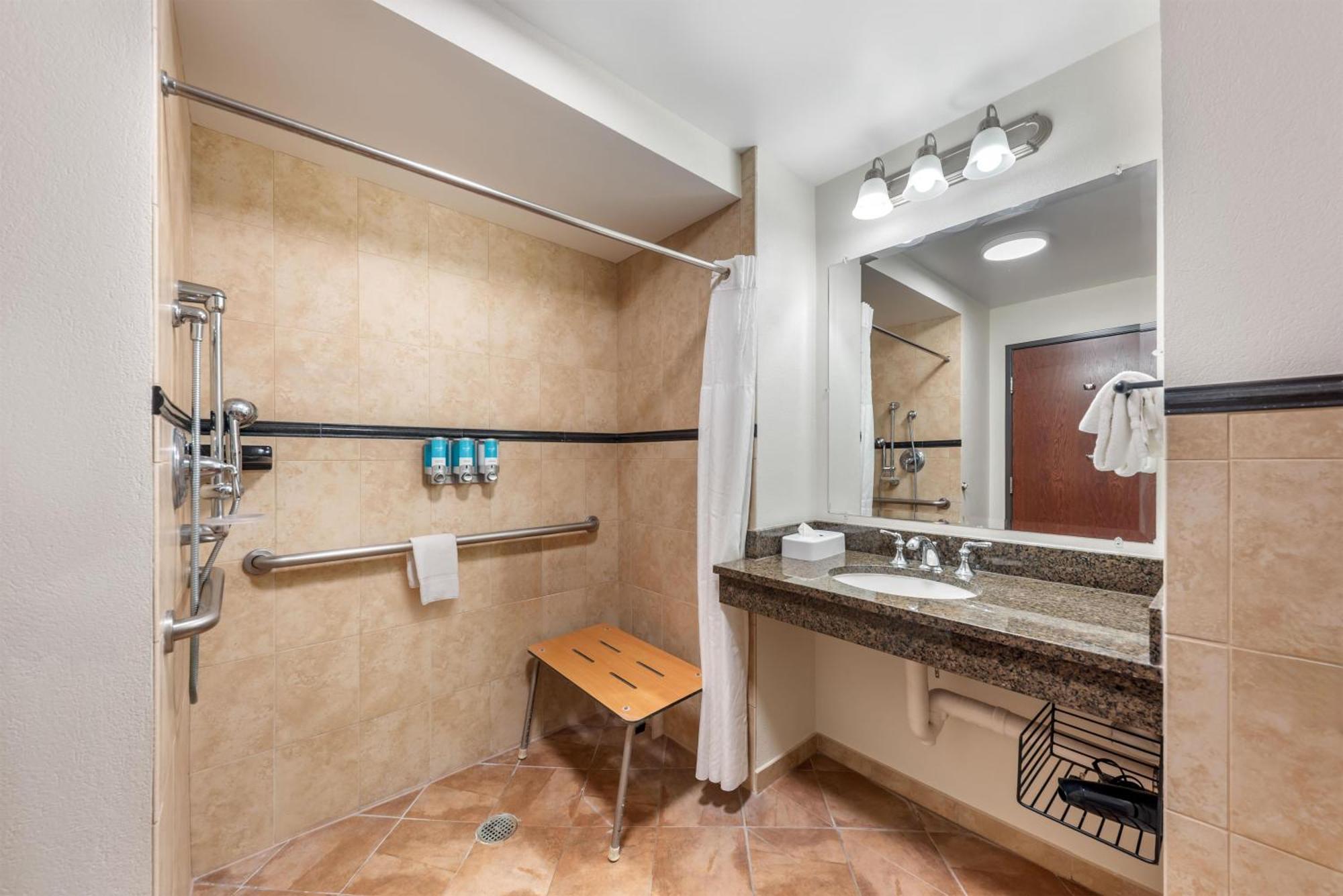 Deluxe Queen Room Two Queen Beds Hearing Accessible Roll Shower